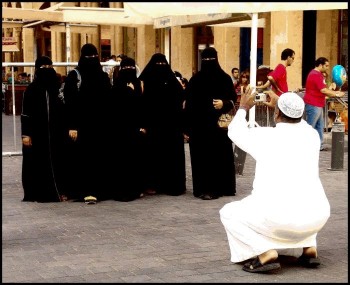 Muslim covered women being photographed.jpg